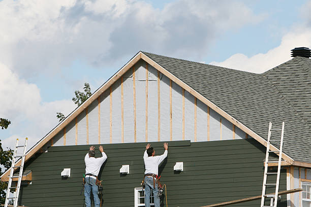 Professional Siding Installation technician working in College Park, GA